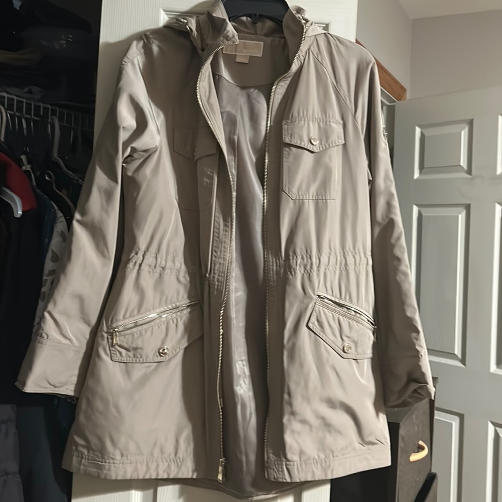 Brand new Michael kors light jacket. Women’s size M